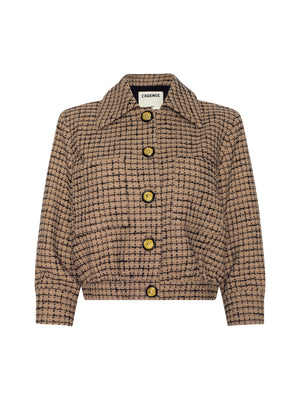 The Jia Cropped Tweed Jacket features a beige and black windowpane tweed pattern, collar, long sleeves, and five large decorative front buttons. The label inside the collar reads LAGENCE.