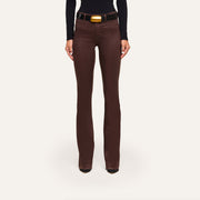 Ruth Coated Straight-Leg Jean in dark brown, featuring a high-rise, straight-leg fit and a black belt with a gold buckle.