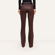Rear view of Ruth Coated Straight-Leg Jean in dark brown, high-rise straight-leg coated stretch denim, styled with a black textured belt.
