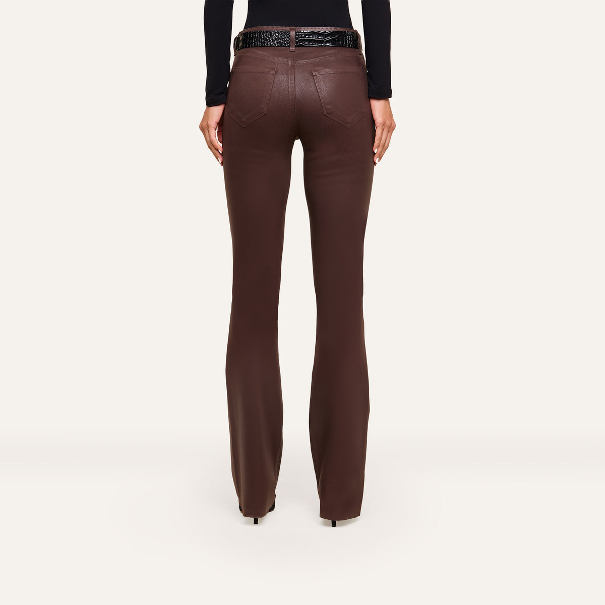Rear view of Ruth Coated Straight-Leg Jean in dark brown, high-rise straight-leg coated stretch denim, styled with a black textured belt.