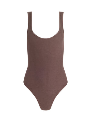 The Nica Scoopneck Bodysuit is a brown, ribbed piece with a sculpted fit and high-cut legs. It features high-recovery stretch and is shown against a white background.