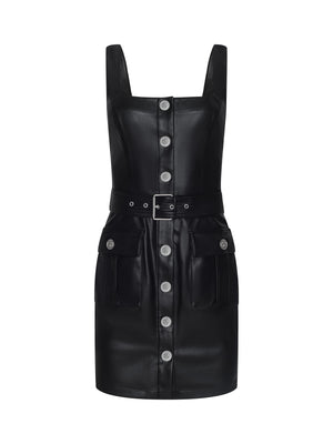 The L’AGENCE Midy Vegan Leather Dress features black vegan leather, a square neckline, structured fit, front silver buttons, two front pockets with button flaps, and a matching belted waist, shown on a white background.