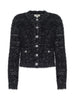 Una un cardigan in maglia