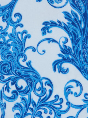 Blue baroque print with ornate, swirling floral patterns on a white background—perfect for designs like the Krysta Bandeau Top with removable straps.