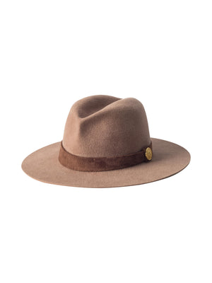 The Rivera Suede Band Fedora is a handcrafted light brown felt hat with a wide brim, a dark brown suede band, and a small gold side button, styled elegantly against a white background.